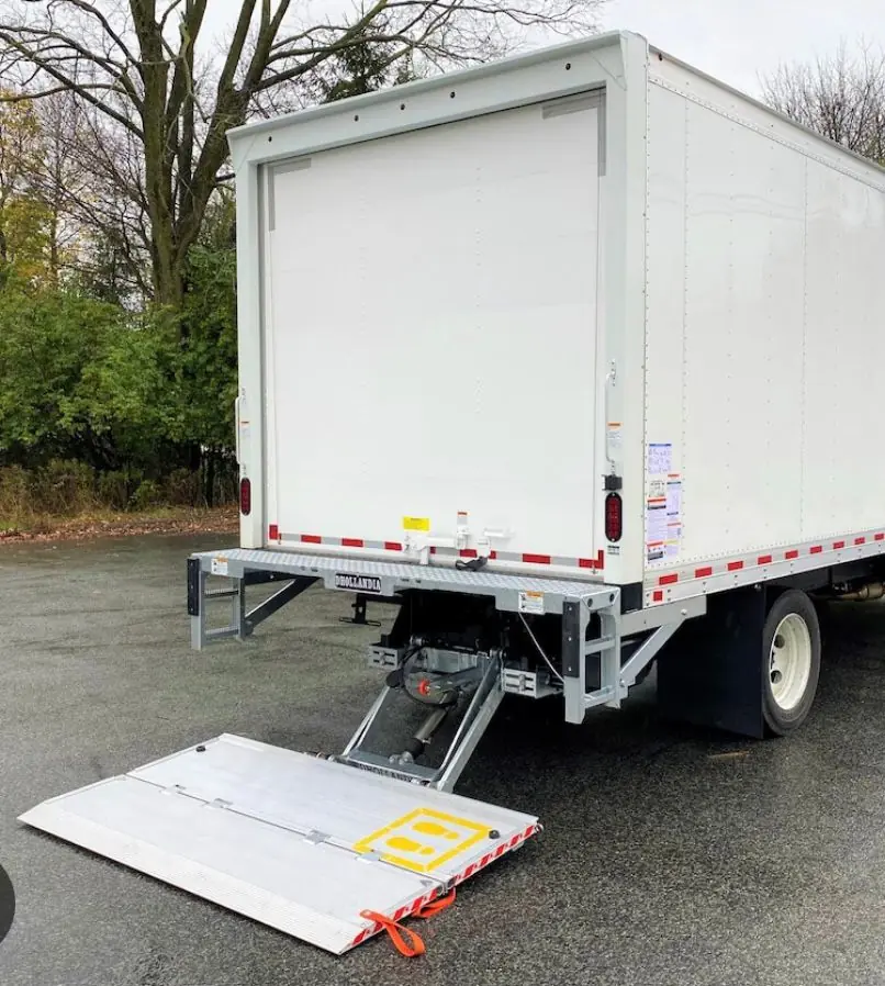 Box vehicle with tail lift deployed